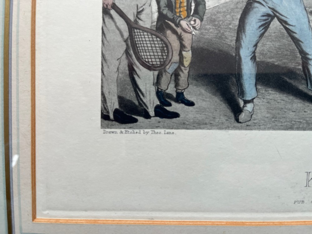 Framed hand-coloured nineteenth-century print depicting figures playing rackets in a prison courtyard. View V