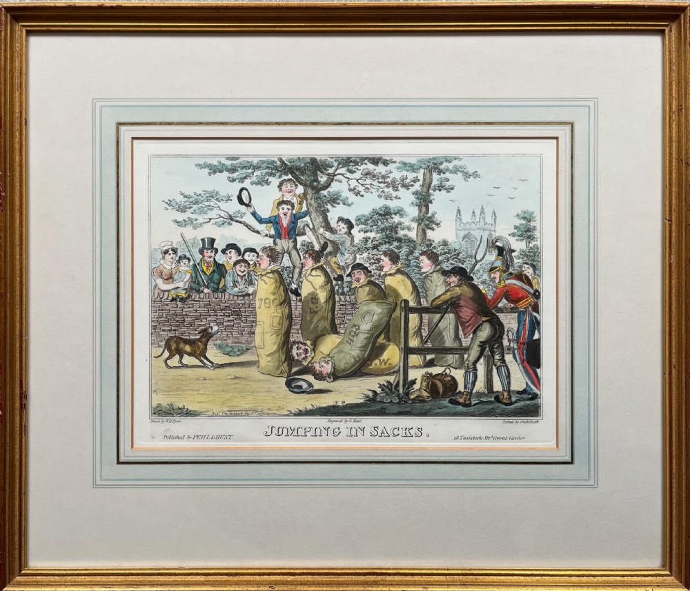 A framed Georgian hand-coloured satirical print titled Jumping in Sacks depicting figures participating in a sack race within a gilded wood frame and lined cream mount.