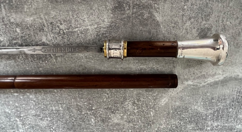 Silver Handled Sword Stick with a Toledo blade
