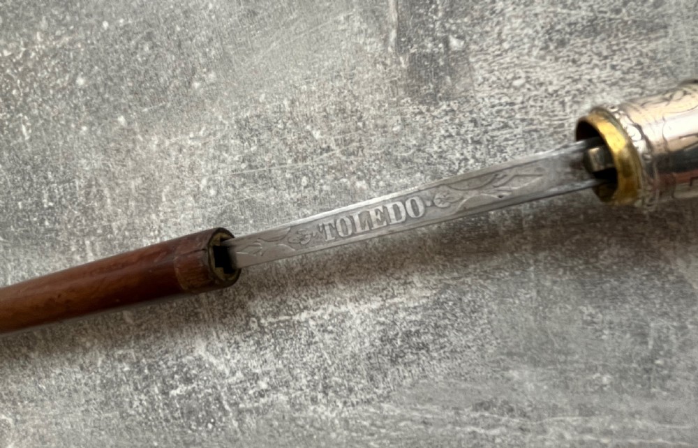 Silver Handled Sword Stick with a Toledo blade View XI