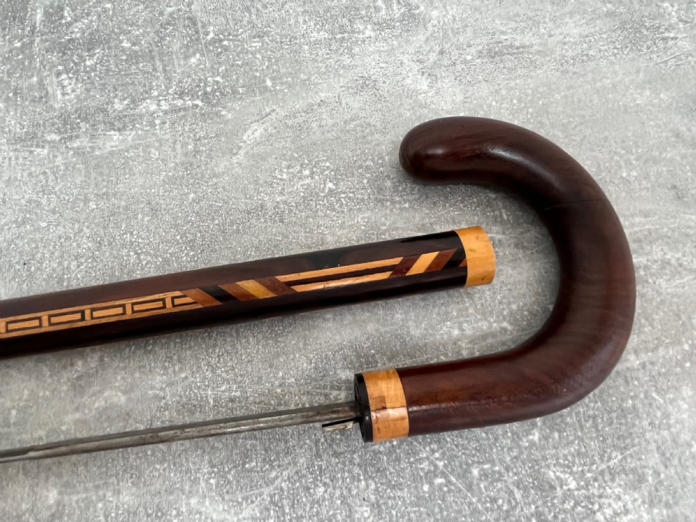 Hardwood Inlaid Sword Stick with a Toledo Blade View VIII