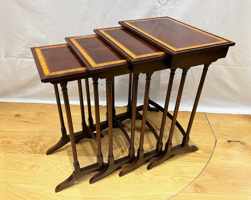 Nest of 4 Inlaid Mahogany Tables