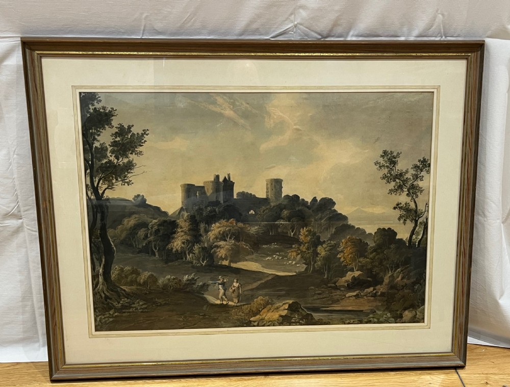 An 18th-century watercolour painting depicting figures walking along a path towards a medieval castle ruin surrounded by trees. View V