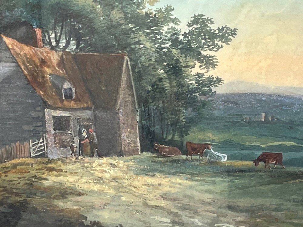 A framed 19th-century watercolour painting featuring a rustic cottage nestled among lush trees with livestock in a rolling landscape, presented in a gilt frame. View IV