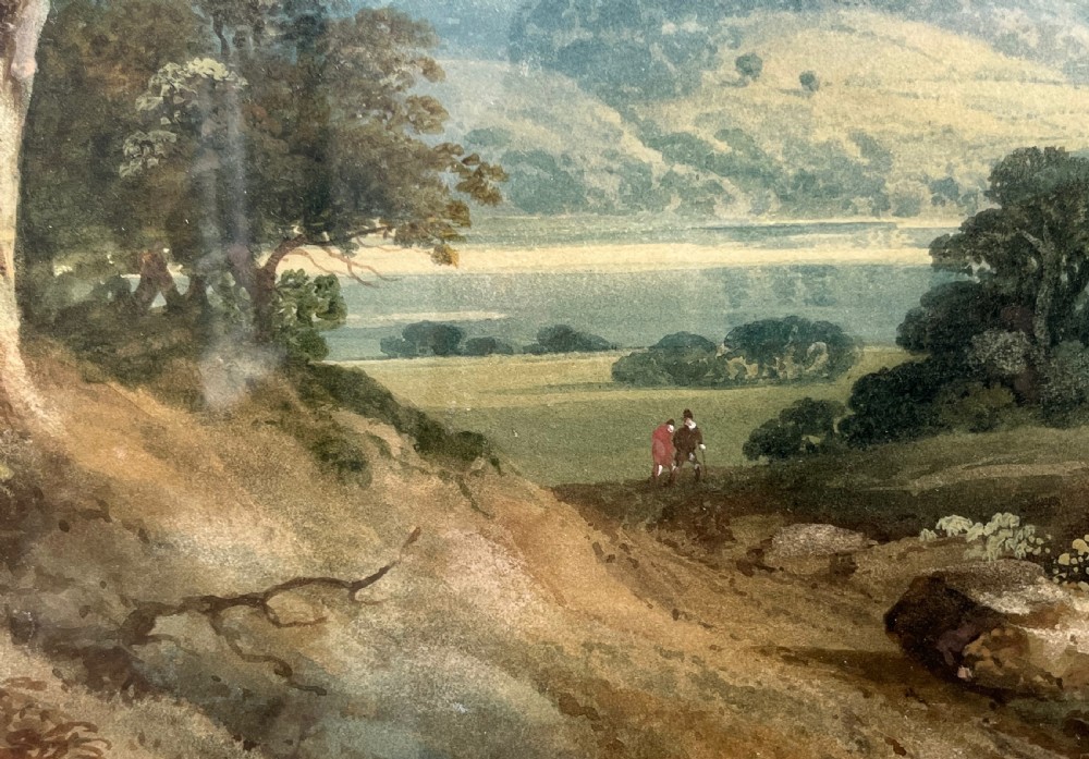 A framed 19th-century watercolour painting featuring a rustic cottage nestled among lush trees with livestock in a rolling landscape, presented in a gilt frame. View XII