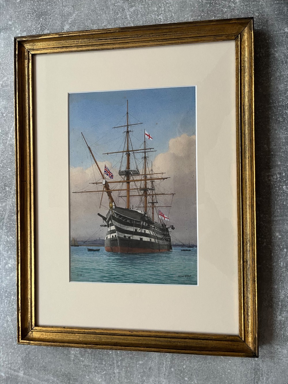 A framed 19th-century watercolour painting depicting the historic naval ship HMS Victory at sea, housed in a giltwood frame with a cream mount. View VIII