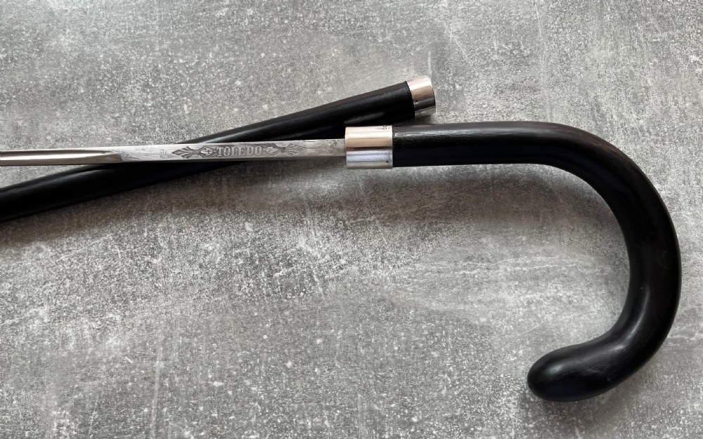 Crook Handled Malacca Sword Stick with Silver Mounts and a Toledo Blade View III