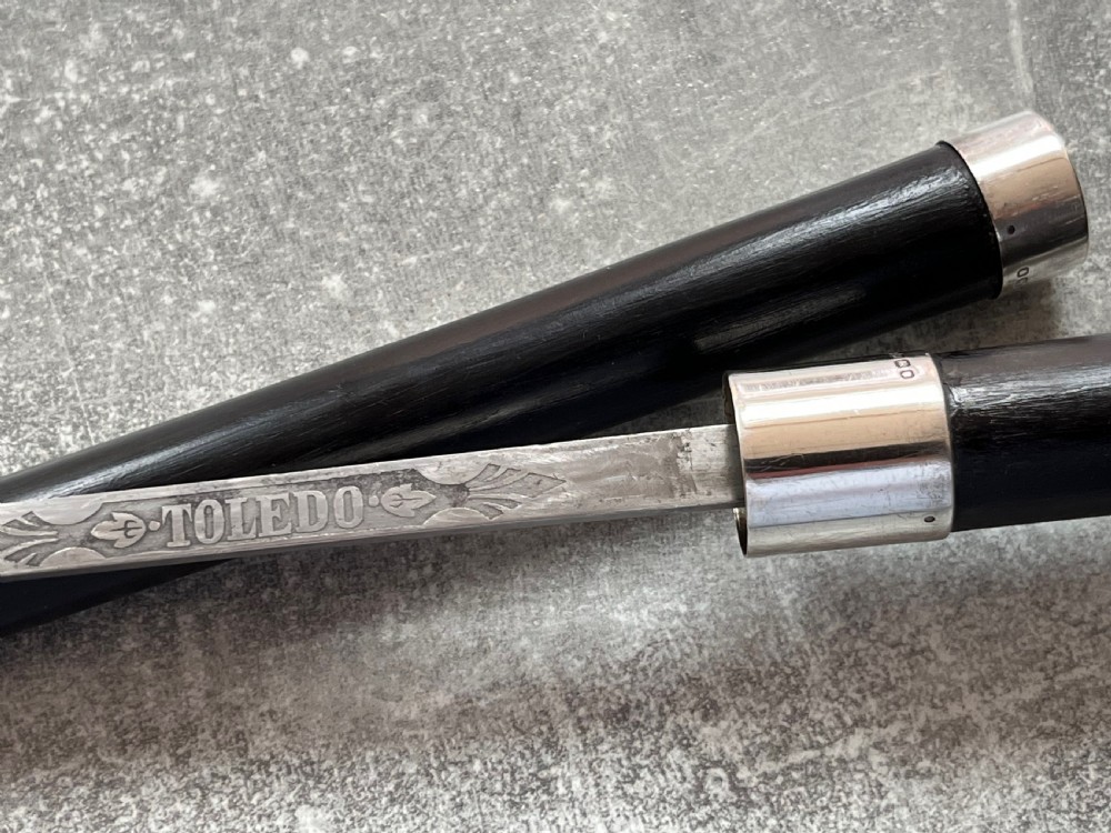 Crook Handled Malacca Sword Stick with Silver Mounts and a Toledo Blade View IV