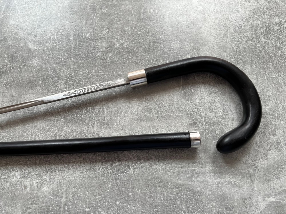 Crook Handled Malacca Sword Stick with Silver Mounts and a Toledo Blade View IX