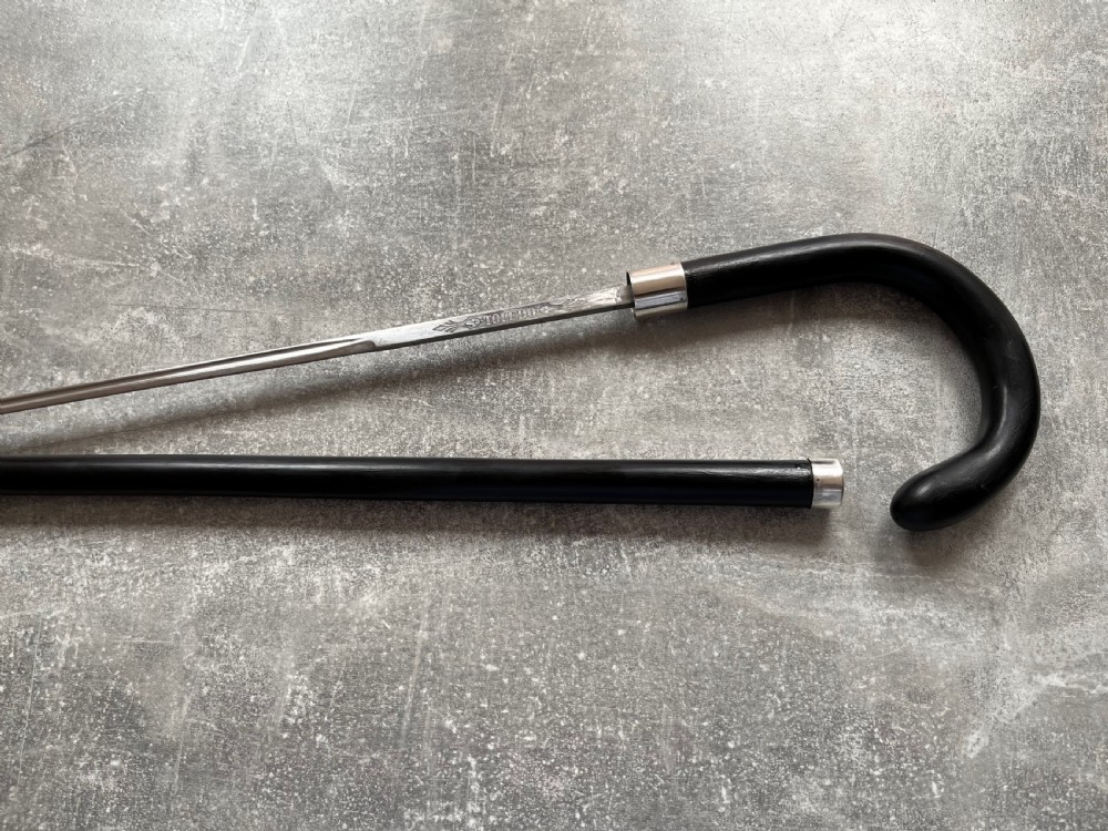Crook Handled Malacca Sword Stick with Silver Mounts and a Toledo Blade View XI