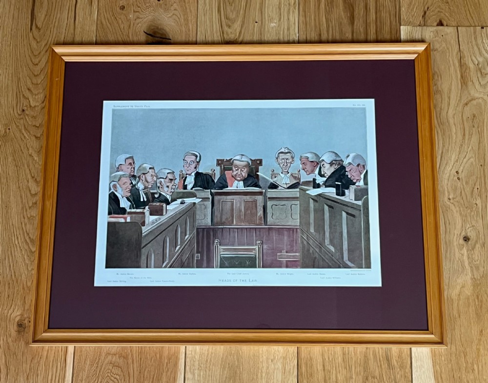 A framed late Victorian lithographic print entitled Bench and Bar featuring a crowd of barristers and judges in traditional wigs and gowns framed in light wood with a burgundy mount. View IV
