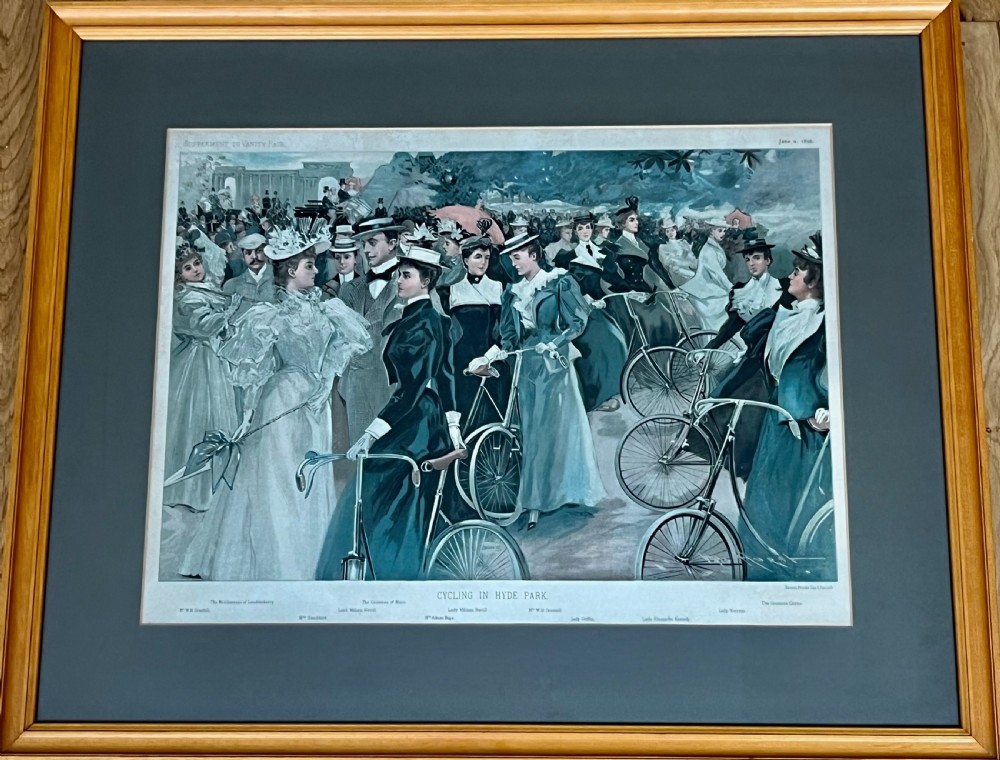 A framed Victorian colour lithograph depicting an equestrian crowd in Hyde Park London set within a light wood frame and wash line mount. View V