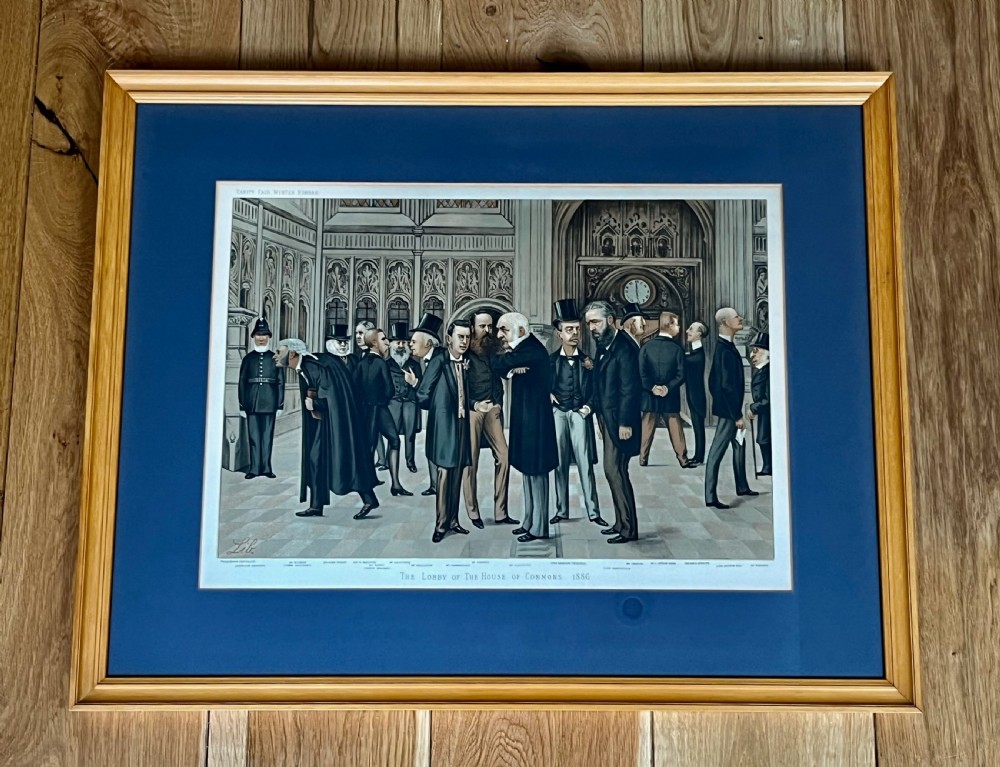 A framed 19th-century Vanity Fair chromolithograph featuring political caricatures by Spy set within a terracotta mount and wooden frame. View IV