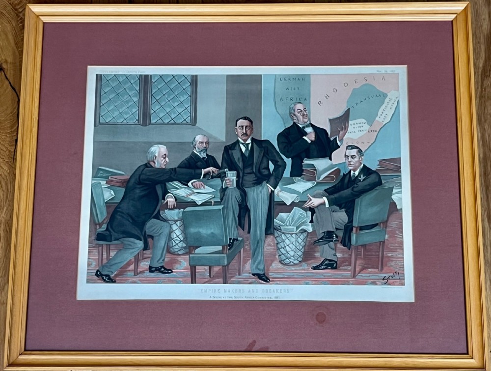 A framed 19th-century Vanity Fair chromolithograph featuring political caricatures by Spy set within a terracotta mount and wooden frame. View XI