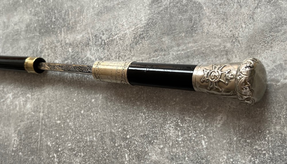 Black Lacquered Sword Stick, Silver Plated Mounts, Toledo Blade. View IX