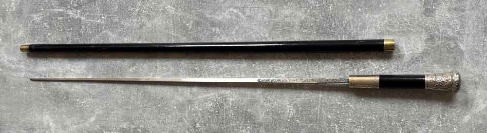 Black Lacquered Sword Stick, Silver Plated Mounts, Toledo Blade. View XIV