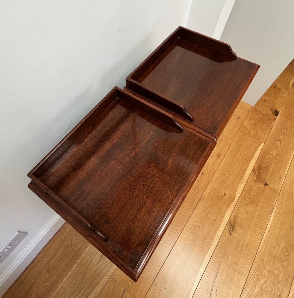 A pair of antique mahogany bedside cabinets featuring gallery tops, single panelled doors, brass drop handles, and solid plinth bases. View XIII