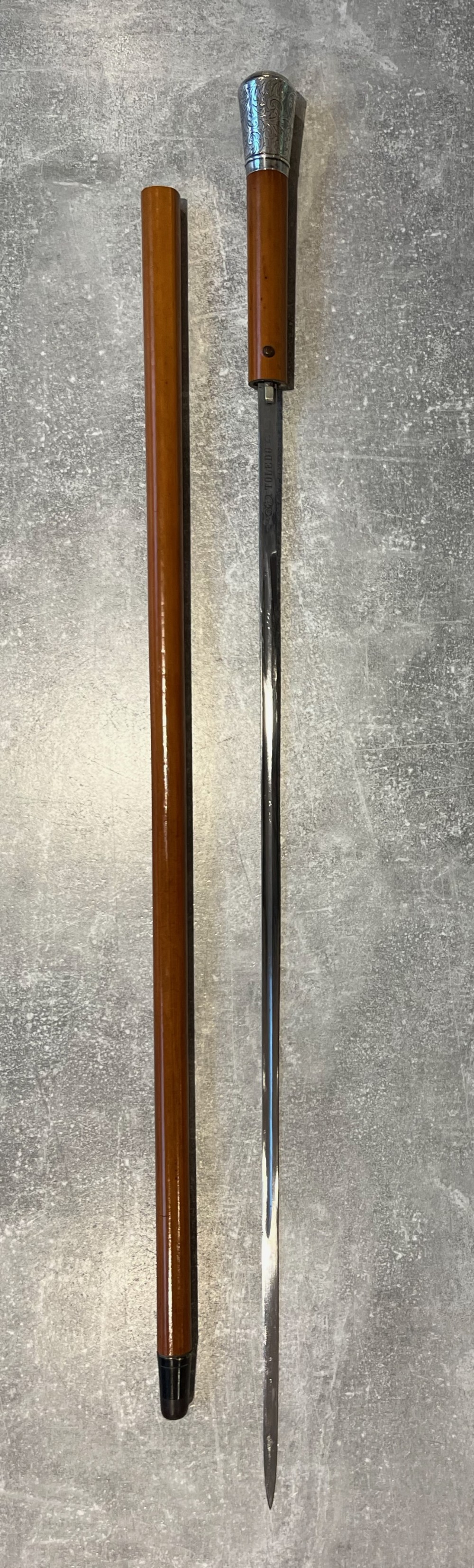 Silver Topped Malacca Sword Stick with Toledo Blade