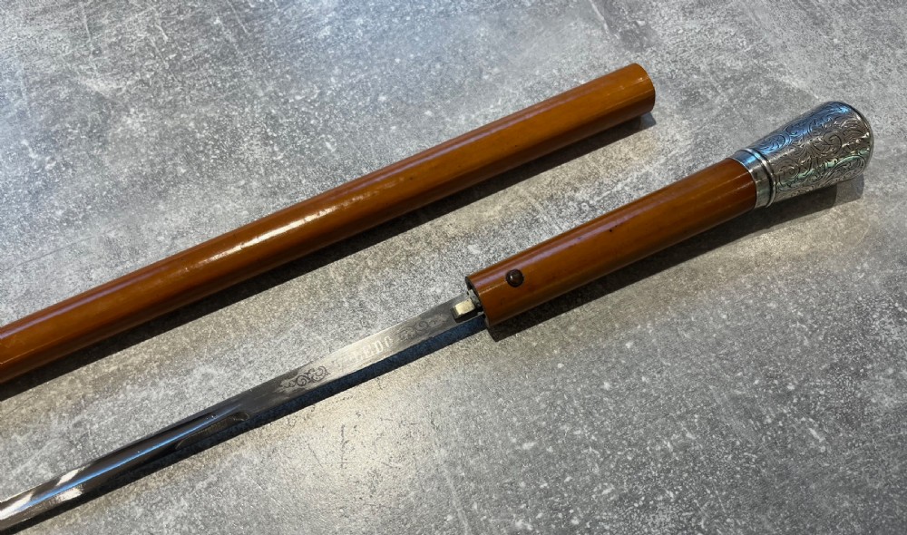 Silver Topped Malacca Sword Stick with Toledo Blade View III