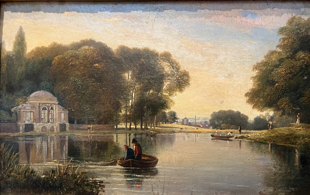 A 19th-century oil painting on board depicting figures in a rowboat on a calm river flanked by trees and classic architecture, housed in an ornate giltwood frame. View II