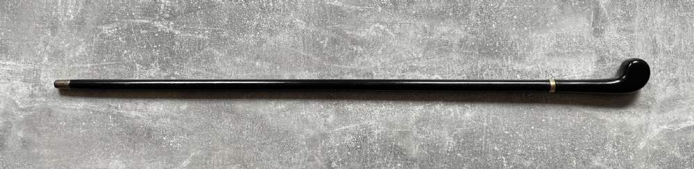 A Victorian ebonised wood walking stick shown in two parts alongside a slender concealed steel Toledo blade. View XV
