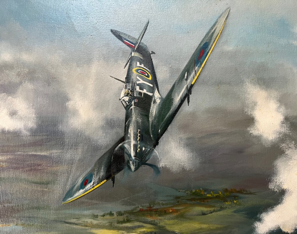 A framed oil painting on canvas depicting a Supermarine Spitfire aircraft diving through clouds over a green countryside landscape, signed by artist Dion Pears. View V