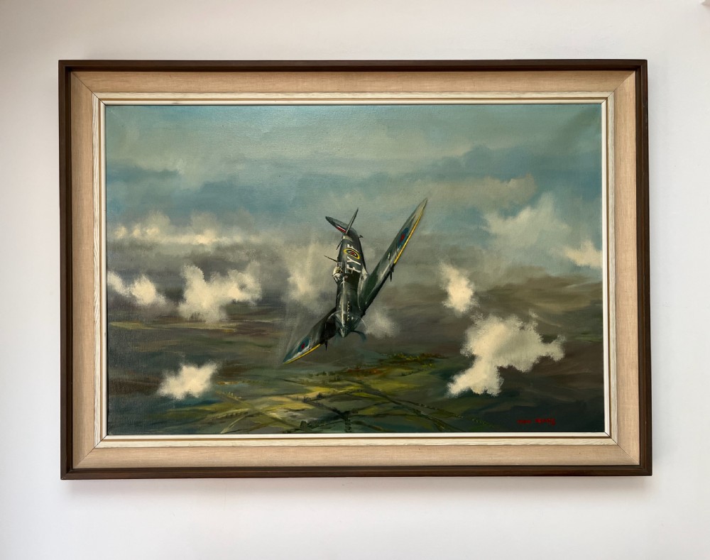 A framed oil painting on canvas depicting a Supermarine Spitfire aircraft diving through clouds over a green countryside landscape, signed by artist Dion Pears. View VI