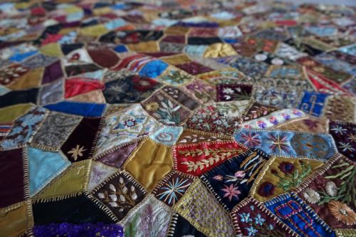 fig 1. A fine Victorian Aesthetic 'crazy' patchwork parlour panel, comprising intricately hand-worked silk and velvet sections.