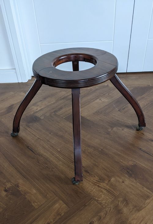 an articulated mahogany baby stroller inthe georgain style - CATEGORY: ANTIQUE TABLES - DATED 1920