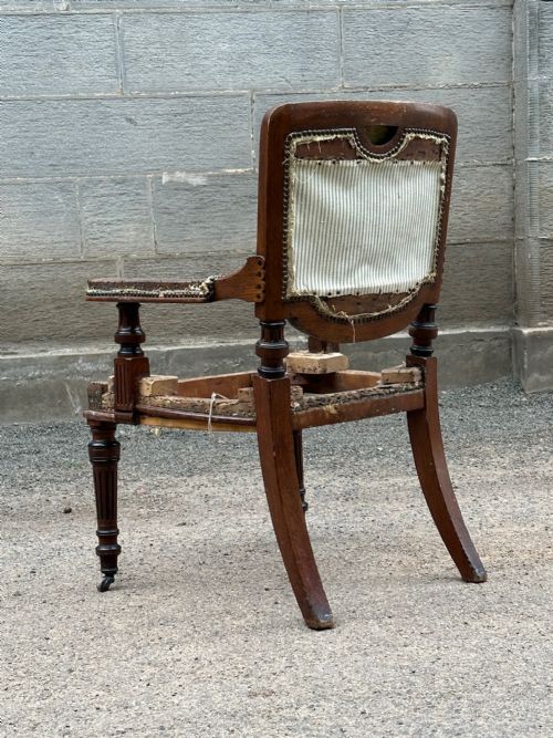 ATTRIBUTED TO CHARLES BEVAN 18151891 AN OAK LIBRARY BERGERE ARMCHAIR MADE BY JAMES LAMB OF MANCHESTER C1870 - ADDITIONAL PHOTO 2
