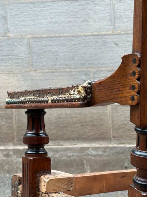 ATTRIBUTED TO CHARLES BEVAN 18151891 AN OAK LIBRARY BERGERE ARMCHAIR MADE BY JAMES LAMB OF MANCHESTER C1870 - ADDITIONAL PHOTO 3