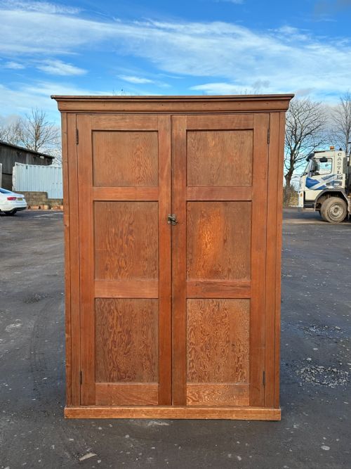 A PAIR OF PANELFRONTED PINE AND OREGON PINE CUPBOARDS LATE 19TH EARLY 20TH CENTURY - ADDITIONAL PHOTO 1