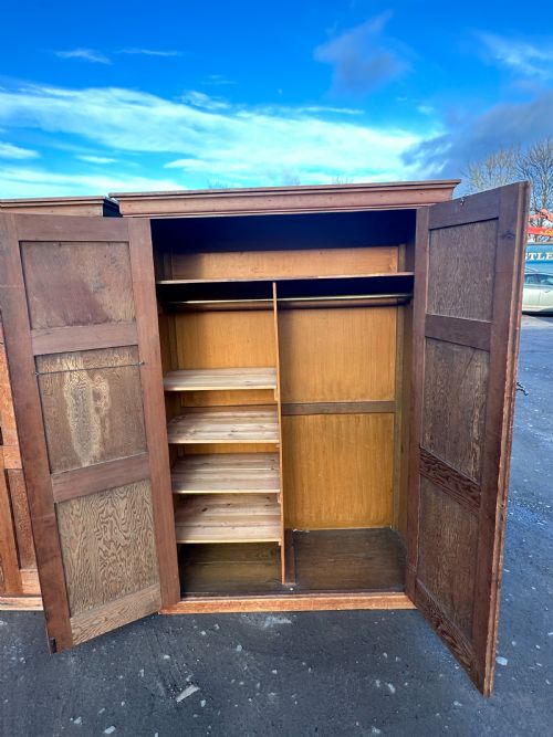 A PAIR OF PANELFRONTED PINE AND OREGON PINE CUPBOARDS LATE 19TH EARLY 20TH CENTURY - ADDITIONAL PHOTO 3