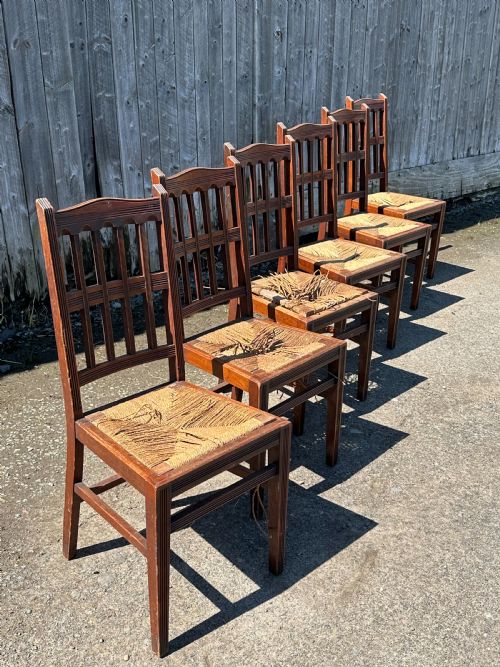 fig 2. A set of eight Arts and Crafts walnut dining chairs in the manner of Philip Webb, 1860's