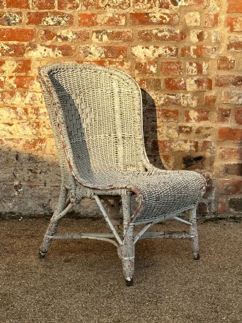 AN UNUSUAL ENGLISH CANE AND ROPE WORK LOW CHAIR FIRST QUARTER 20TH CENTURY - ADDITIONAL PHOTO 2