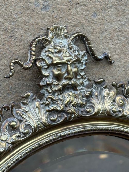 A FINELY CAST LATE 19TH CENTURY BRASS WALL MIRROR - ADDITIONAL PHOTO 1
