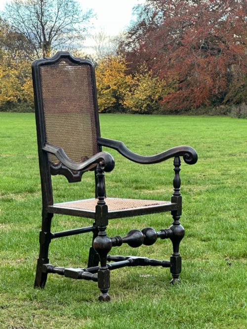 AN INTERESTING PAINTED WALNUT OPEN ARMCHAIR IN THE CAROLEAN TASTE POSSIBLY AMERICAN C17001720 - ADDITIONAL PHOTO 1