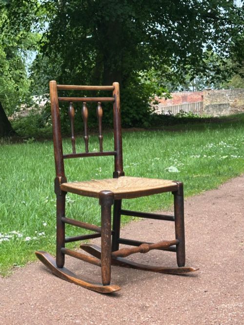 a small george iii lancashirecheshire stained ash and woven rush rocking chair - CATEGORY: ANTIQUE CHAIRS - DATED 19TH CENTURY