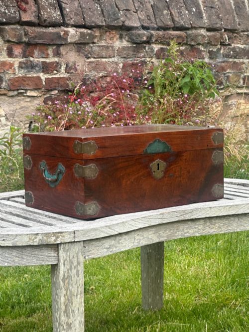 A 19TH CENTURY ANGLO INDIAN PADOUK AND BRASS BOUND DEED BOX