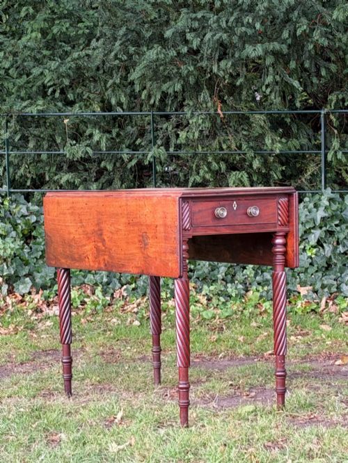 A George IV Mahogany Drop-leaf Table, Probably Scottish, Possibly Irish