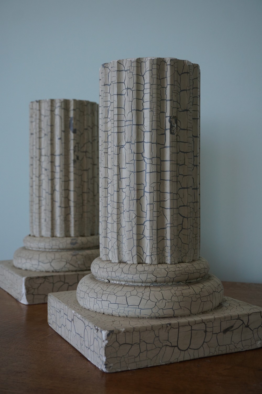 A pair of ornamental textured plaster classical columns c.1900 in the Grand Tour tradition