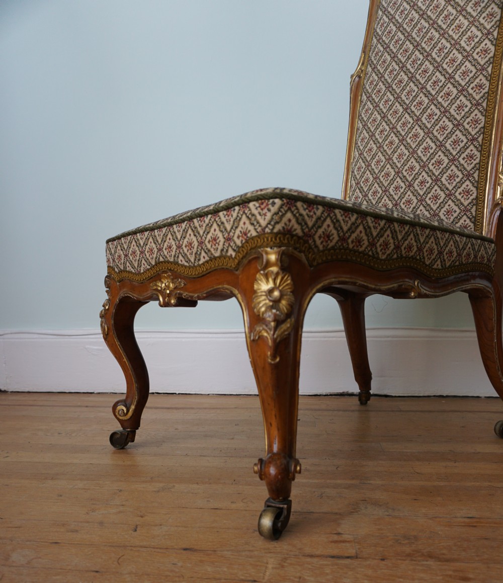 A 19th century walnut and carved giltwood slipper chair c.1880 attributed to Morison & Co. View IX