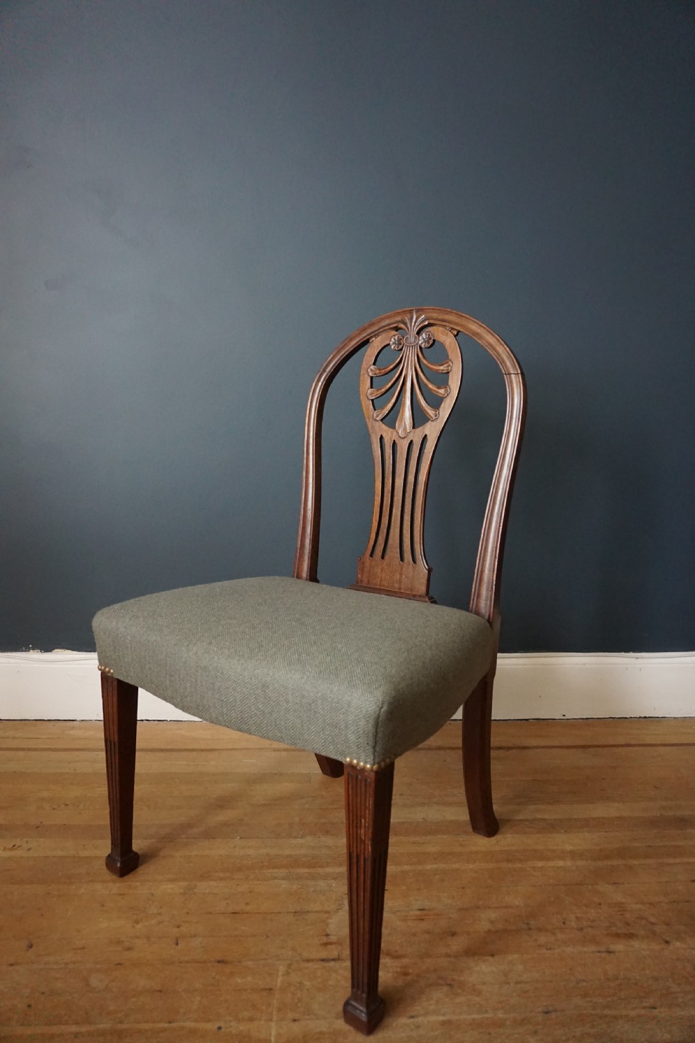 A George III carved mahogany chair to a design by Robert and John Linnell c.1770