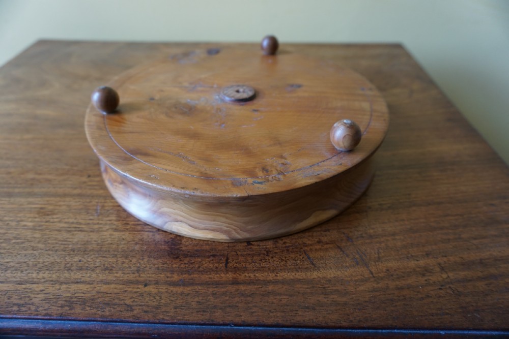 An unusual 19th century yew-wood magnum wine coaster View III