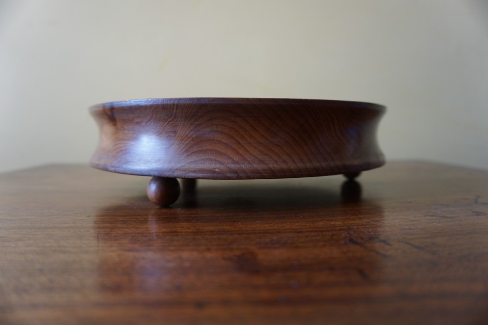 An unusual 19th century yew-wood magnum wine coaster