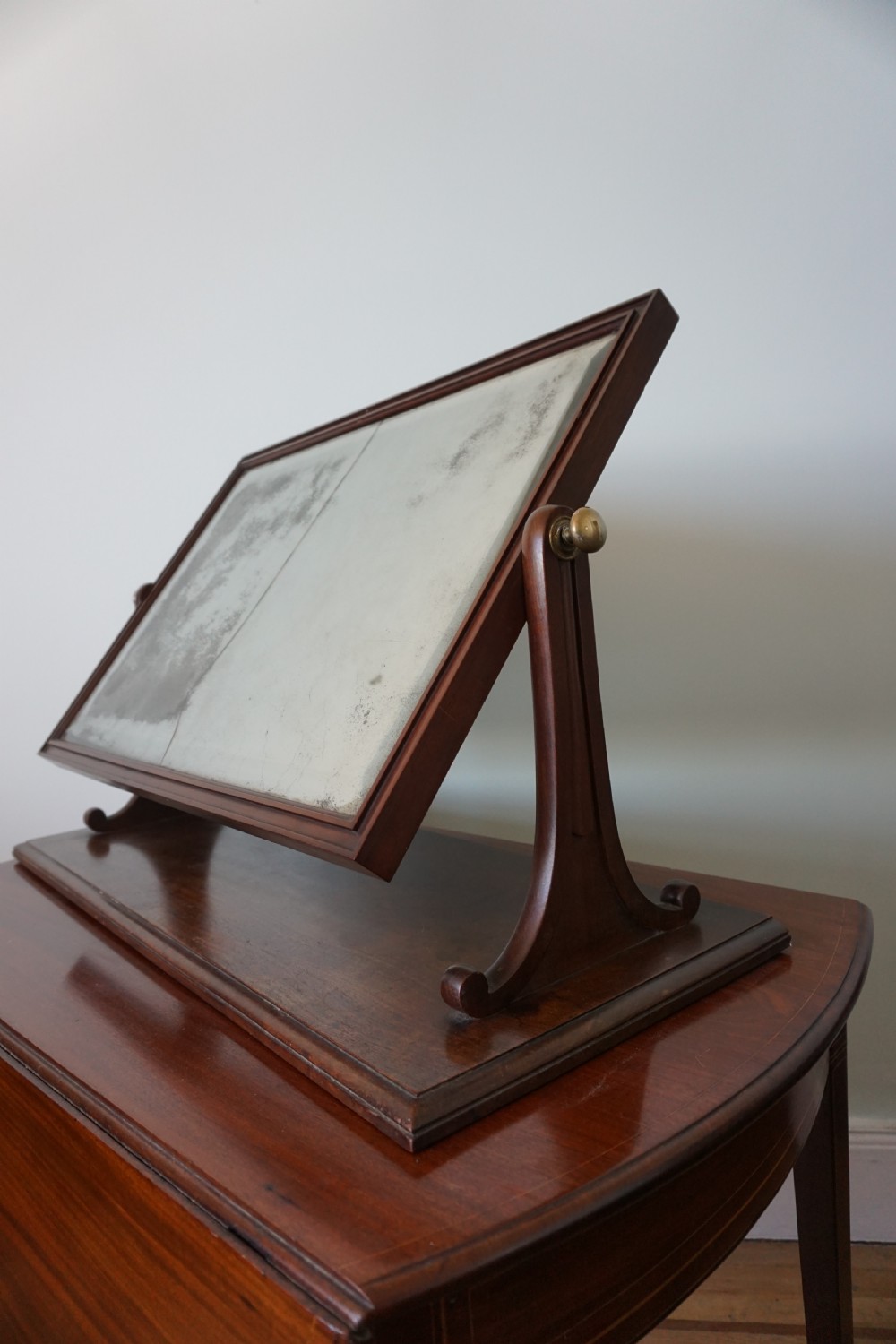 A large early 19th century mahogany dressing mirror attributed to Gillows View IV