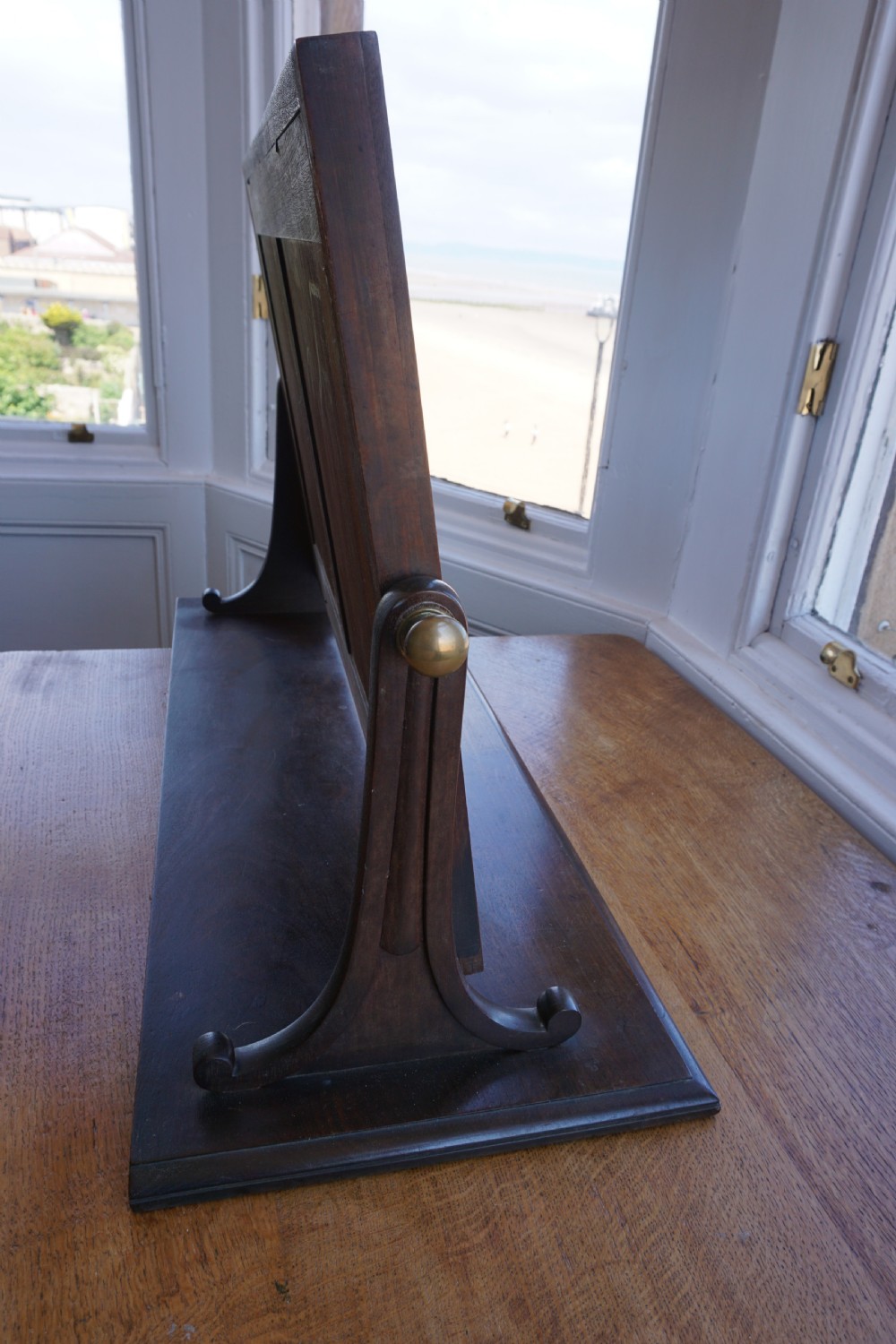 A large early 19th century mahogany dressing mirror attributed to Gillows View VII