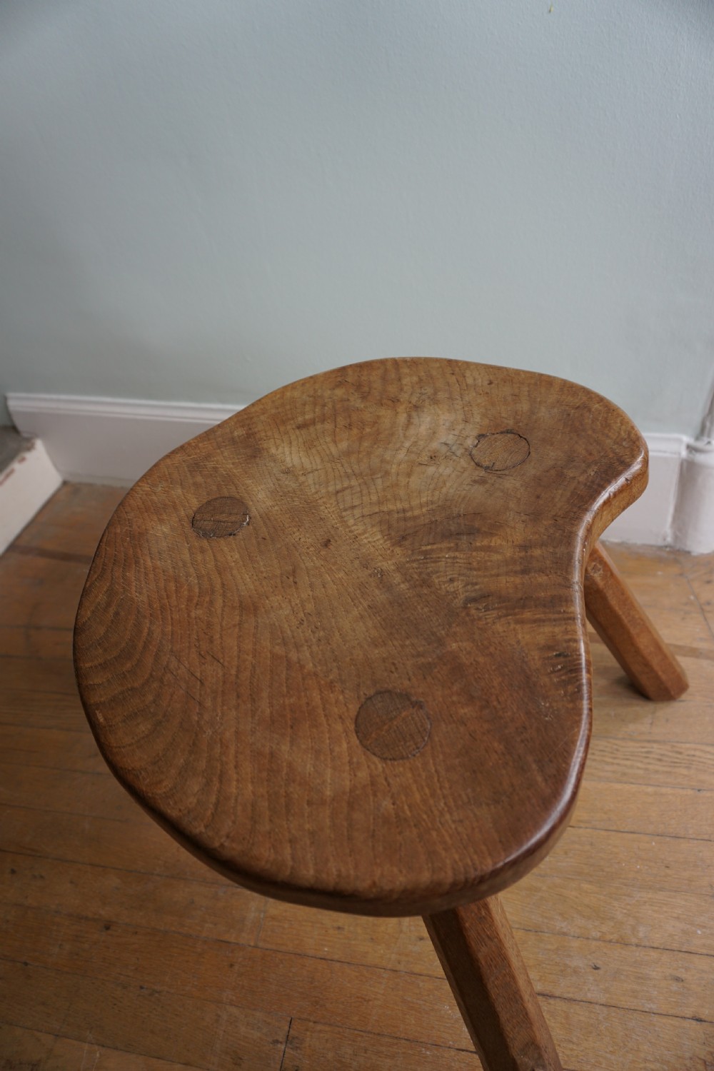 Robert 'Mouseman' Thompson (1876-1955): A rare oak Cow stool, made in the 1930s View V