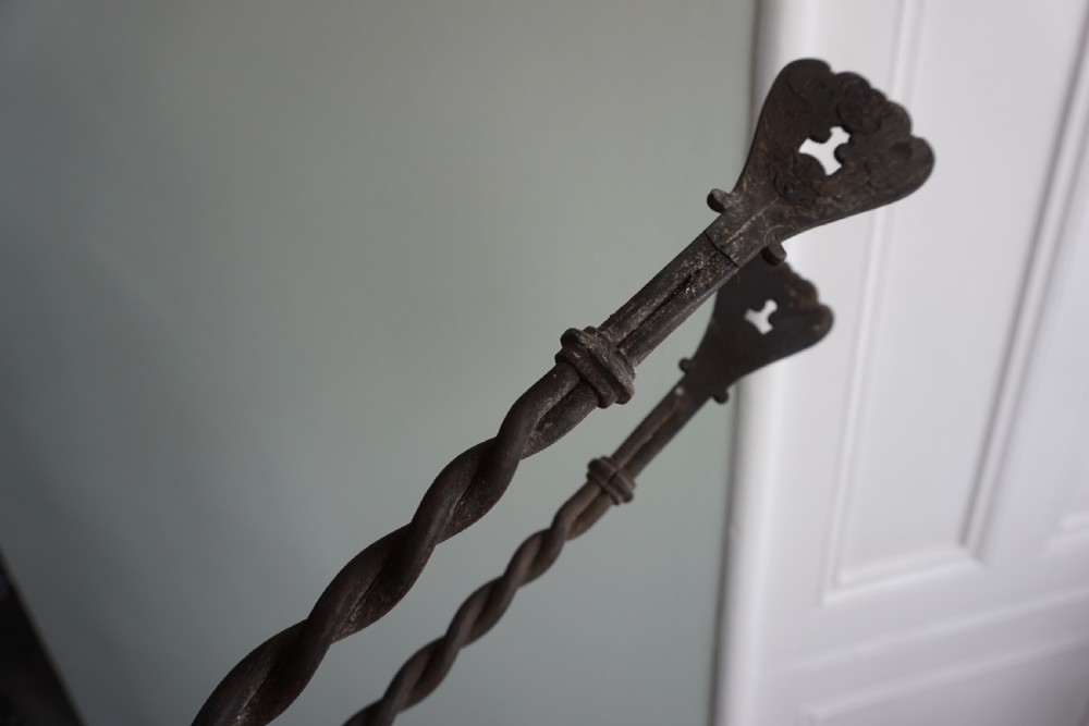 An interesting pair of wrought iron fire tongs, probably late 17th or early 18th century View VI