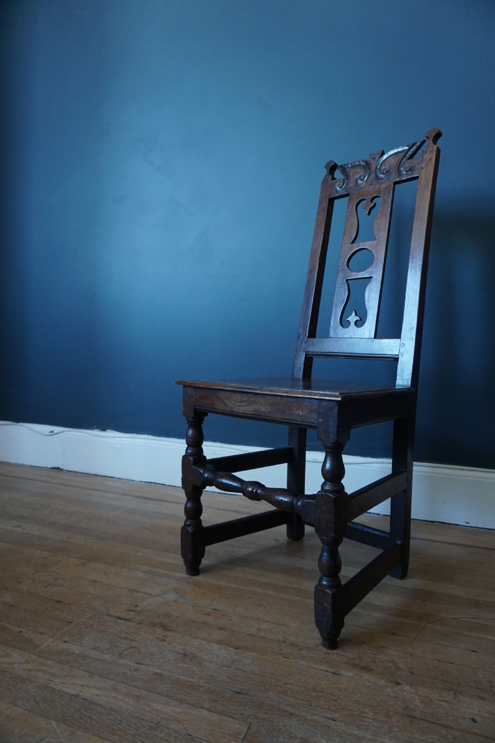 An unusual Scottish oak and mixed timbers high-back chair, probably Aberdeenshire, first half 18th century